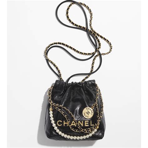 gold metal chanel bag|Chanel bag black gold chain.